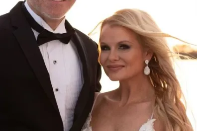 a man and a woman posing for a picture