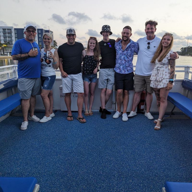 a group of people posing for the camera