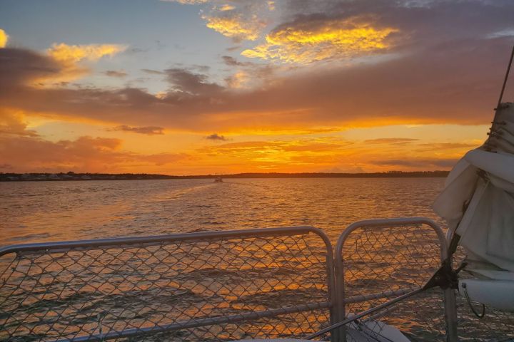 a sunset over a body of water