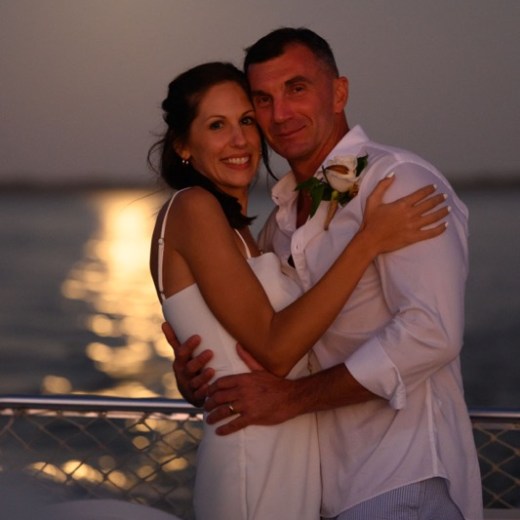 a man and a woman looking at the camera