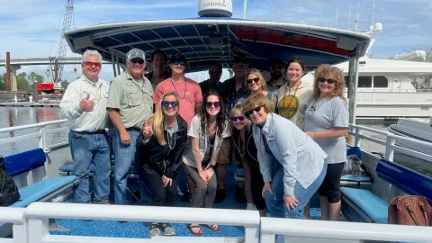 a group of people on a boat