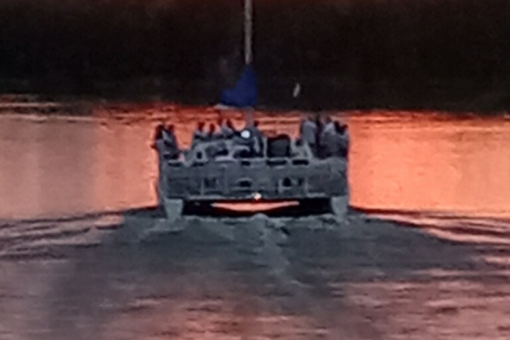 a small boat in a body of water