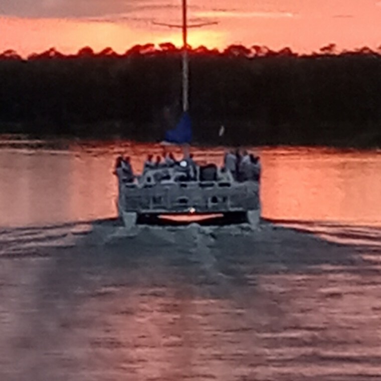 a small boat in a body of water